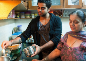 virat kohli in kitchen spent time with his mother saroj kohli